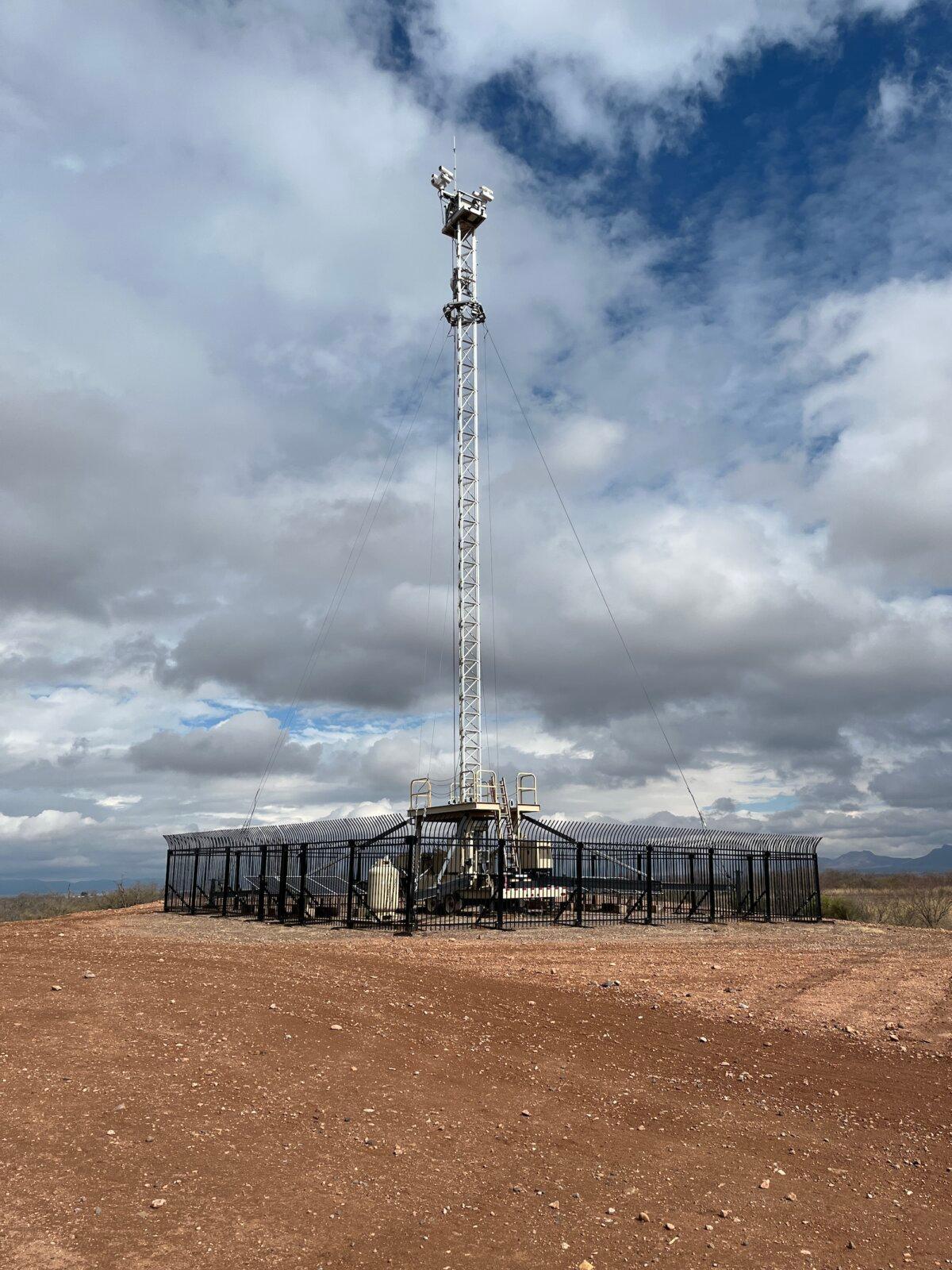 A recently installed solar-powered surveillance tower near the border wall with Mexico in Douglas, Ariz., on Jan. 22, 2026. (Allan Stein/The Epoch Times)