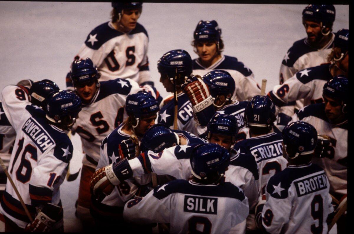 The USA Team celebrates their 4–3 victory over Russia in the semi-final of the Ice Hockey event at the 1980 Winter Olympic Games in Lake Placid, New York, on Feb. 22, 1980. The game was dubbed "The Miracle on Ice." (Steve Powell/Getty Images)