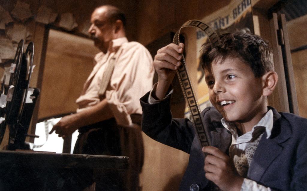 Alfredo (Philippe Noiret, L) and Salvatore Di Vita (Salvatore Cascio), in "Cinema Paradiso." (Cristaldi Film)