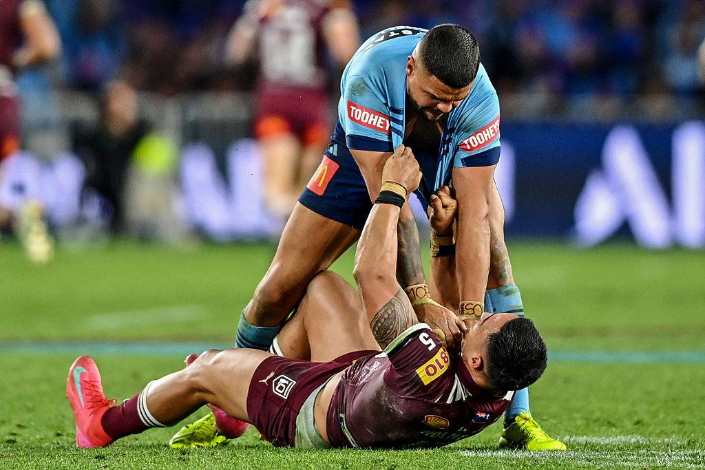 Blues' Latrell Mitchell (above) and Maroons' Valentine Holmes confront during the final game three of the men's State of Origin rugby league series between the New South Wales Blues and the Queensland Maroons in Sydney, Australia on July 9, 2025. (Izhar Khan/AFP via Getty Images)