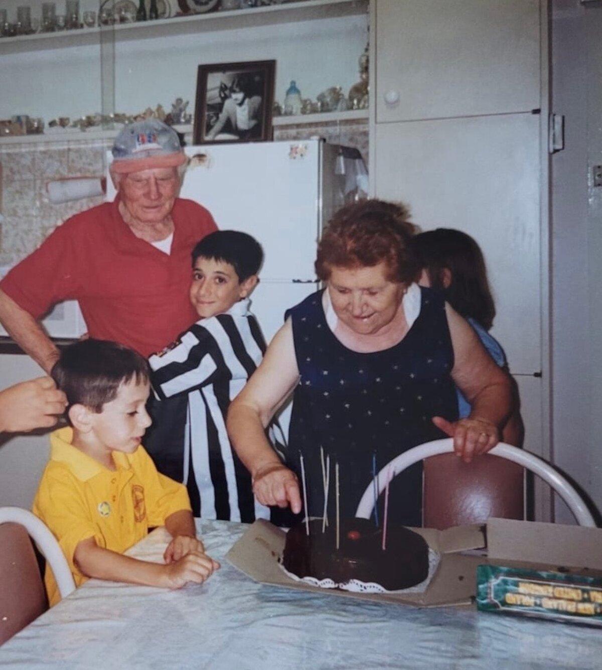 Young Tony Tardio celebrating a birthday party with his grandparents. (Courtesy of Tony Tardio)