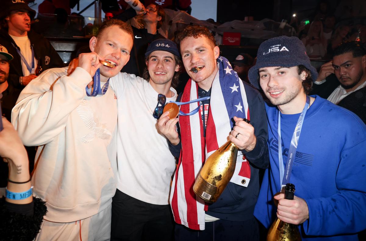 Brady Tkachuk, Jack Hughes, Matthew Tkachuk, and Quinn Hughes attend a celebration of the USA Men's Hockey Team's Olympic Gold at E11EVEN Miami in Miami, Florida, on Feb. 23, 2026. (Alexander Tamargo/Getty Images for E11EVEN Miami)
