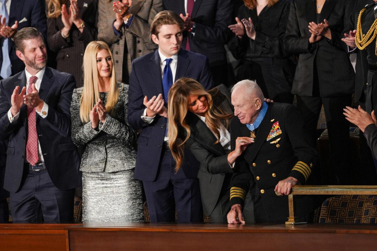 US veteran Captain E. Royce Williams is presented with the Medal of Honor by First Lady Melania Trump at President Donald Trump's first State of the Union address during his second presidential term, in the House Chamber on Capitol Hill in Washington on Feb. 24, 2026. (Madalina Kilroy/The Epoch Times)