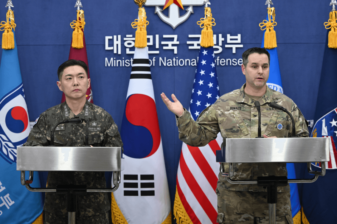 Col. Jang Do-young (L) public affairs director of South Korea's Joint Chiefs of Staff, and U.S. Army Col. Ryan Donald, public affairs director of the U.N. Command, Combined Forces Command, and United States Forces Korea, during a media briefing on the 2026 ROK-U.S. Freedom Shield Military Exercise at the Defense Ministry in Seoul, South Korea, on Feb. 25, 2026. (Jung Yeon-je/Pool Photo via AP)