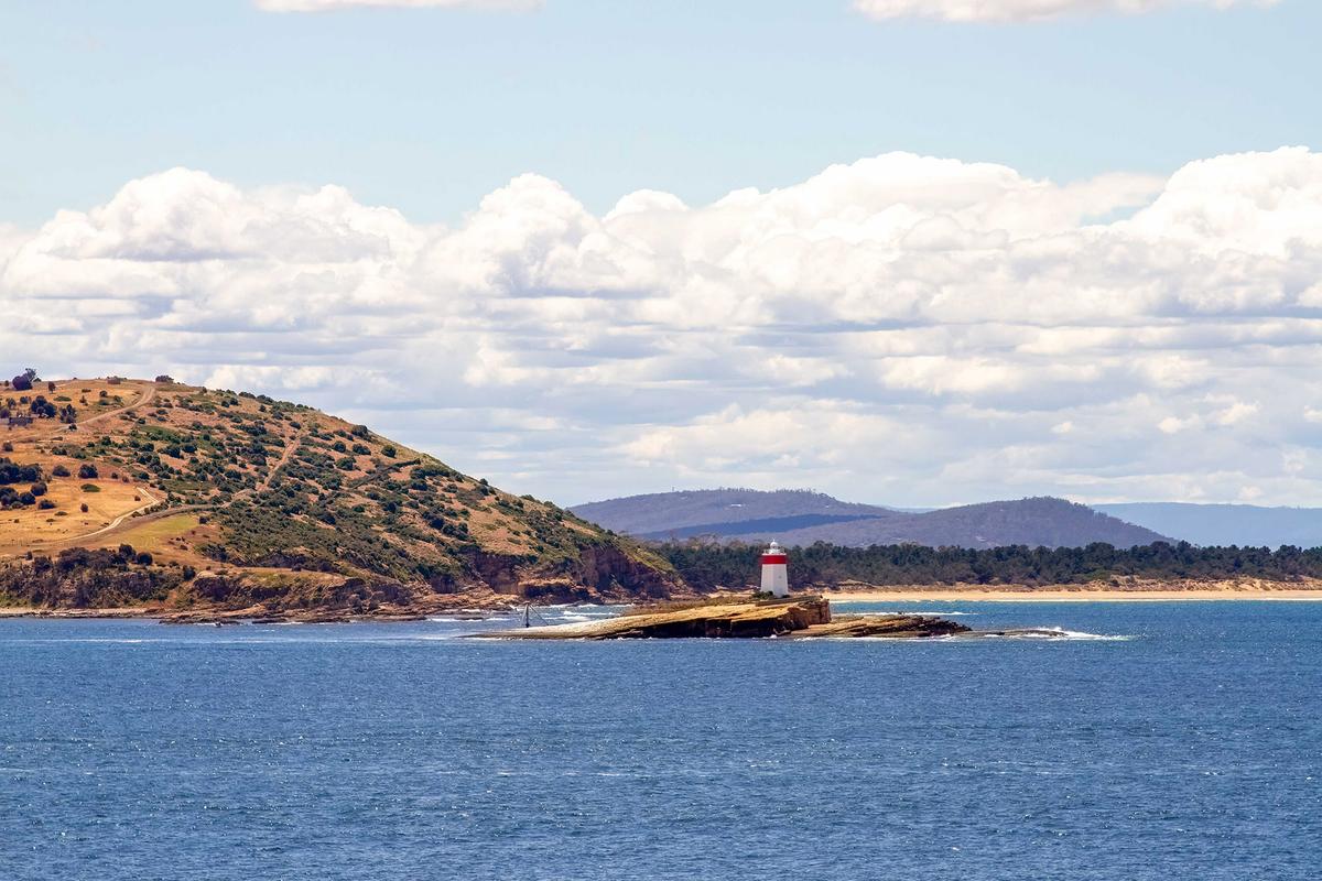 The Iron Pot Lighthouse, which marks the entrance to the Derwent River and Hobart Harbor, is Australia's oldest lighthouse. (karenfoleyphotography/Shutterstock)