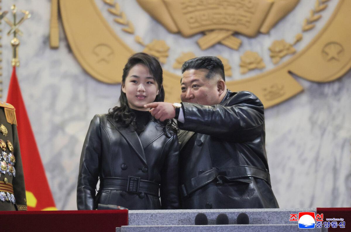 Kim Jong Un attends a parade with his daughter in Pyongyang, North Korea, on Feb. 25, 2026. (Korean Central News Agency/Korea News Service via AP)