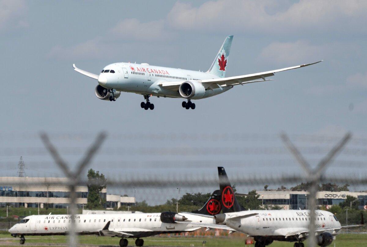Planes at the Montreal-Pierre Elliott Trudeau International Airport on Sept. 13, 2024. (The Canadian Press/Christinne Muschi)