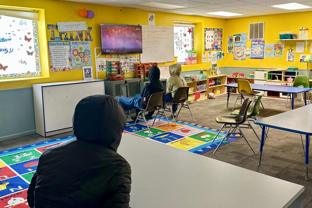 Children watch television at ABC Learning Center in Minneapolis on Dec. 31, 2025. (AP Photo/Mark Vancleave)