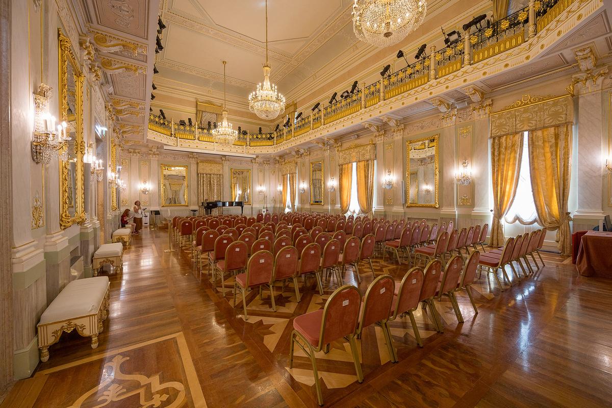 Teatro La Fenice, Venice's historic opera house, has been damaged by multiple fires since its founding in 1792. Its refurbished interior features lavish gold ornamentation and traditional Italian opera-house design. (Cesare Ferrari/Getty Images)