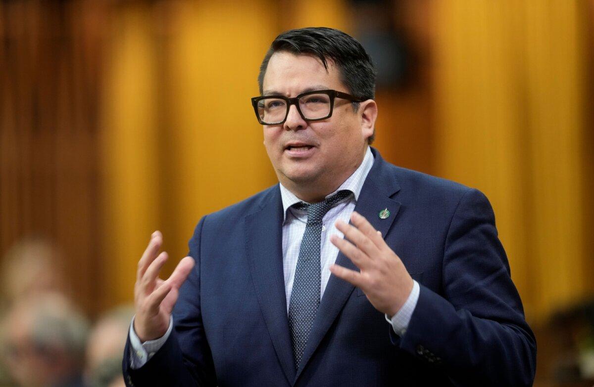 Liberal MP Wade Grant, representing Vancouver Quadra, rises during question period on Parliament Hill in Ottawa on Nov. 21, 2025. (The Canadian Press/Adrian Wyld)