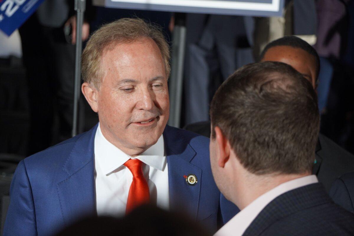 Texas Attorney General Ken Paxton speaks to a supporter in Dallas, Texas, on March 3, 2026. The GOP Senate primary race, in which he competed, has been forced into a runoff, pitting him against Sen. John Cornyn (R-Texas). (Nathan Worcester/The Epoch Times)