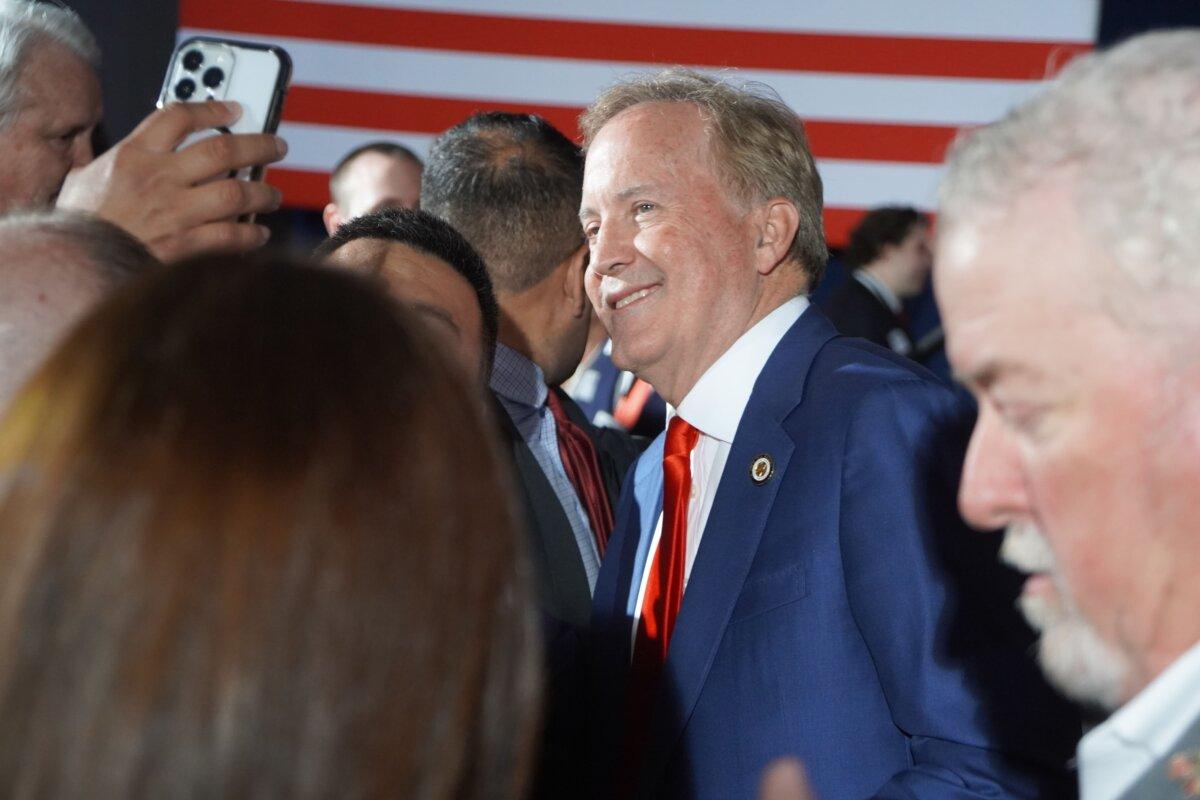 Texas Attorney General Ken Paxton takes photographs with supporters in Dallas, Texas, on March 3, 2026. The GOP Senate primary contender will now face a runoff election against Sen. John Cornyn (R-Texas). (Nathan Worcester/The Epoch Times)