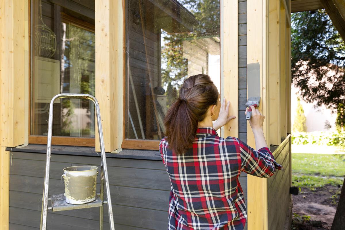 Regular maintenance improves both a home's longevity and its resistance to weather-related damage. (artursfoto/Getty Images)
