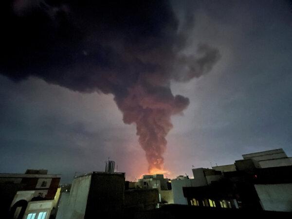 Smoke rises following an explosion, amid the U.S.–Israeli conflict with Iran, in Tehran, Iran, on March 7, 2026. (Majid Asgaripour/West Asia News Agency via Reuters)