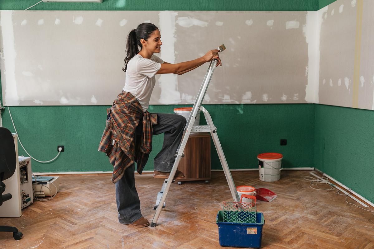 New drywall absorbs paint quickly, which is why primer is applied first to seal the surface and reduce the amount of finish paint required. (supersizer/Getty Images)