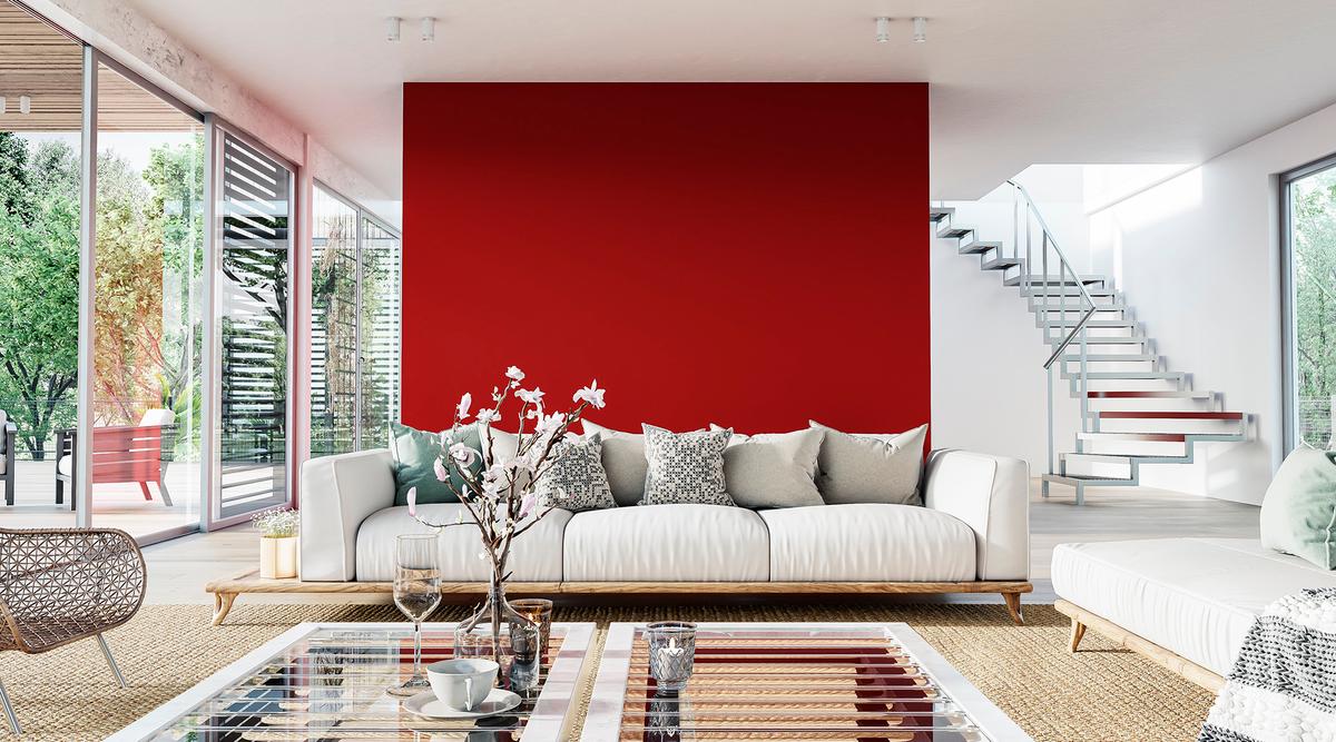 Accent walls became popular as a way to introduce bold color into a room without committing to painting every wall the same shade. (Gladiathor/Getty Images)