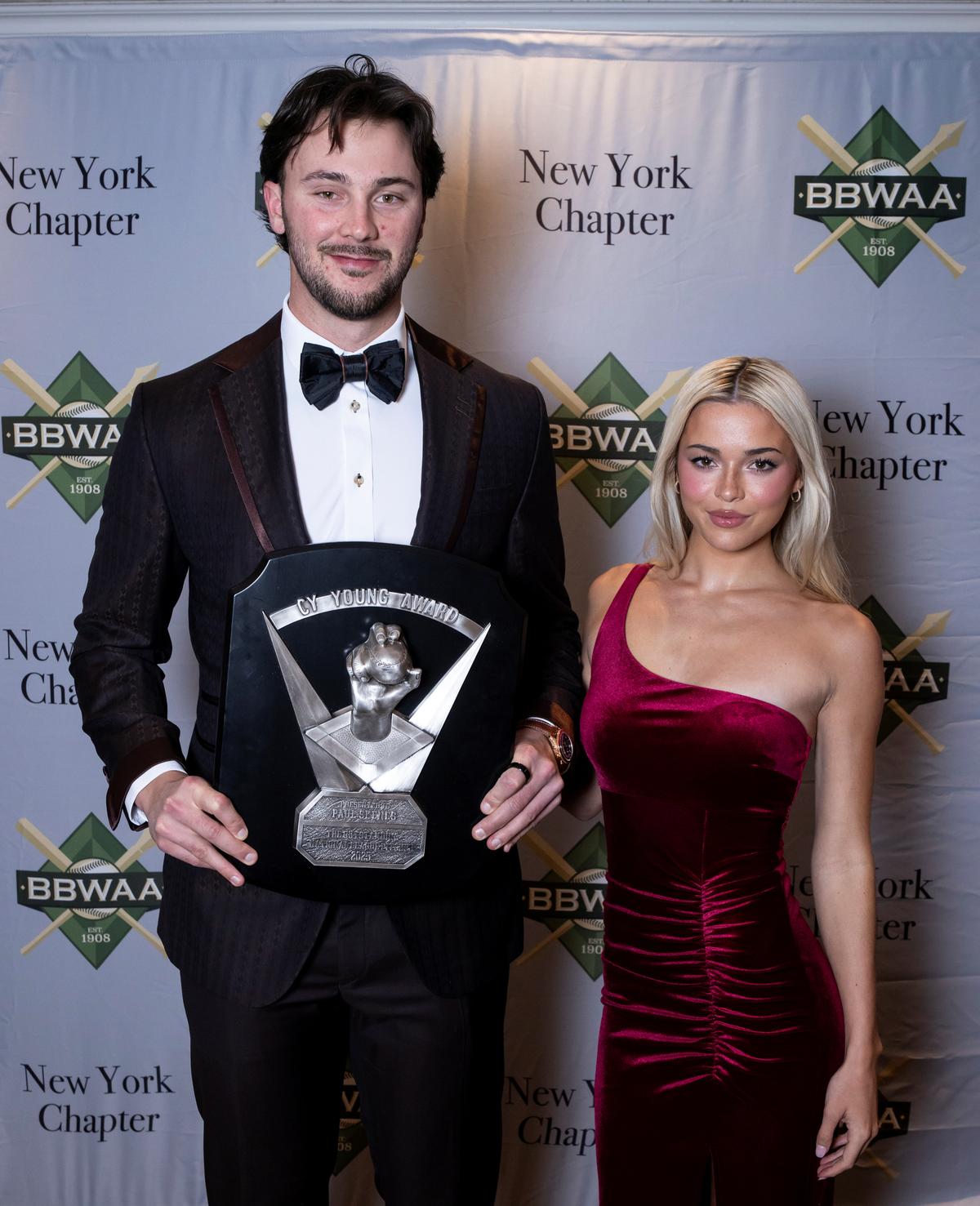 Paul Skenes, National League Cy Young Award Winner, and Livvy Dunne pose for a photo during the Baseball Writers of America Awards Dinner at New York Hilton Midtown in New York City on January 24, 2026. (Michelle Farsi/Getty Images)
