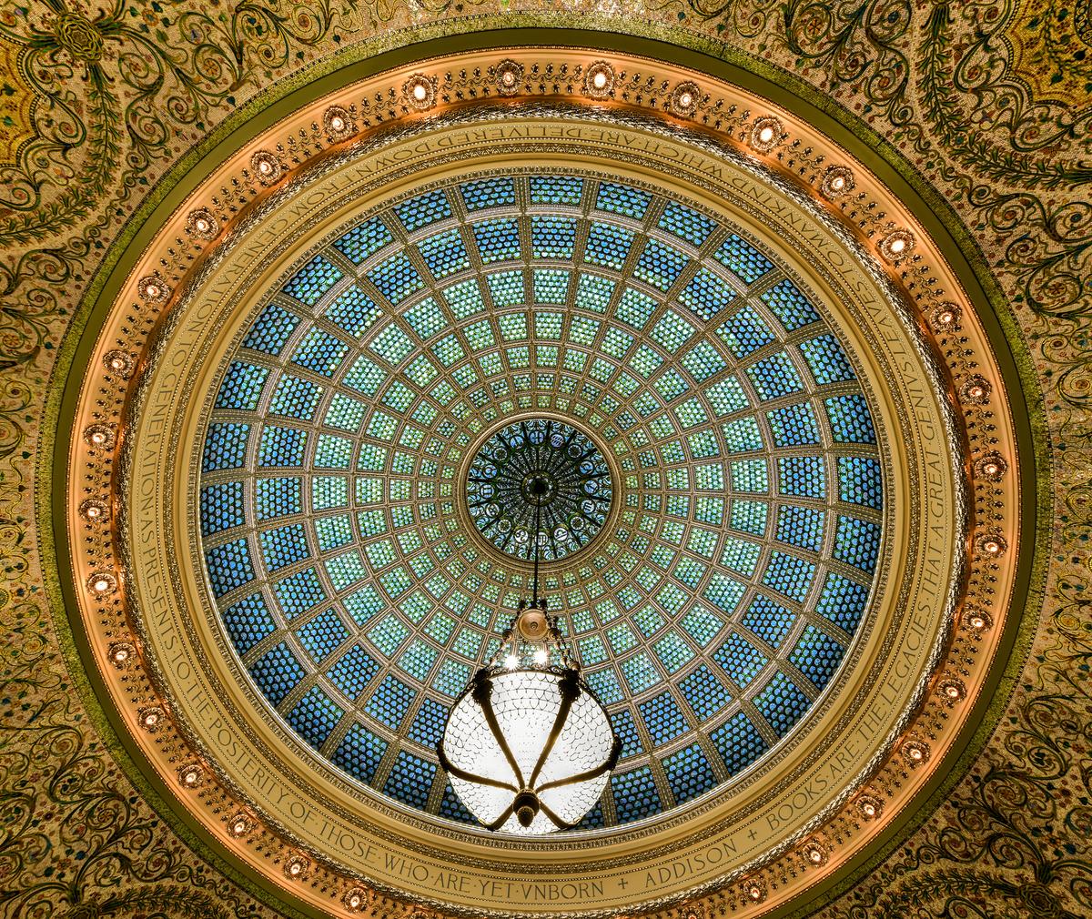 The dome in Preston Bradley Hall contains more than 30,000 individual pieces of glass. Considered the world’s largest Louis Comfort Tiffany art glass dome, its design is a presentation of 12 zodiac signs. The dome is 38 feet in diameter and its art glass is installed in more than 200 sections of a cast-iron frame. The circular base border of the dome includes lighted rosettes. (Felix Lipov/Shutterstock)
