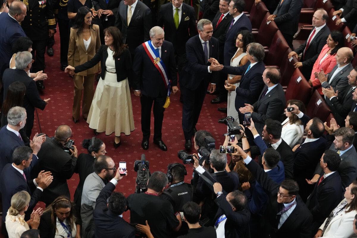 Chilean President José Antonio Kast (C) and his wife, María Pía Adriasola, greet guests on his inauguration day at Congress in Valparaíso, Chile, on March 11, 2026. (Esteban Felix/AP Photo)