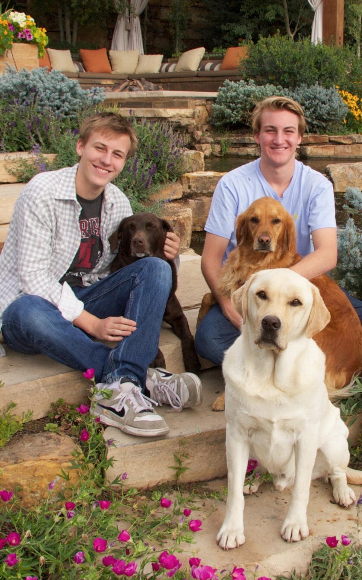 Gannon Wheeler (L), poses with family pets and his twin brother, Wyatt Wheeler, who died in 2022 from the combined toxic effects of kratom, antihistamines and a prescription antidepressant. (Courtesy of Patti Wheeler)