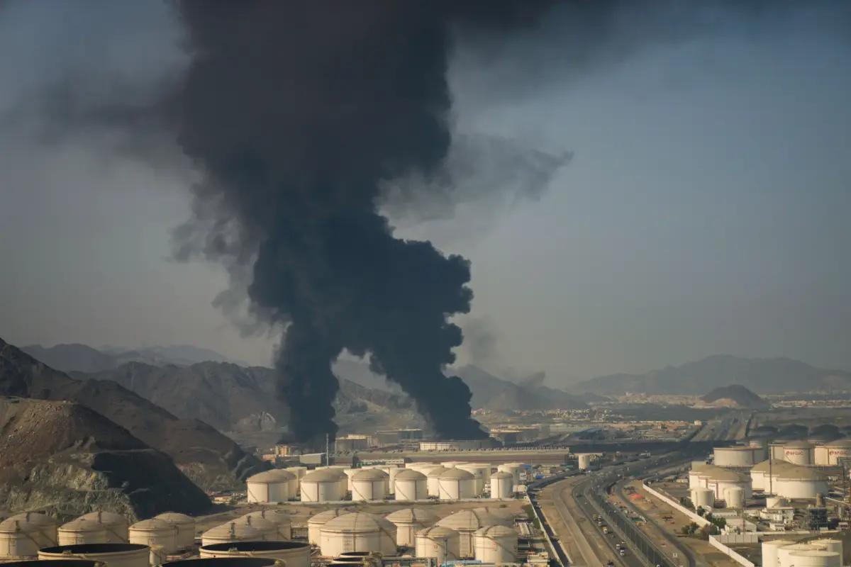 Fire and plumes of smoke rise from an oil facility in Fujairah, United Arab Emirates, on March 14, 2026. (Altaf Qadri/AP Photo)