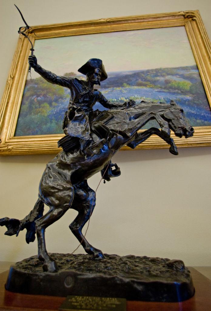 "The Broncho Buster" by Frederic Remington sits on a table inside the Oval Office on Feb. 29, 2008. (Paul. J. Richards/AFP via Getty Images)
