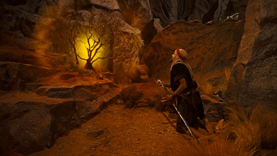 Moses (Charlton Heston) before the burning bush, in "The Ten Commandments." (Paramount)