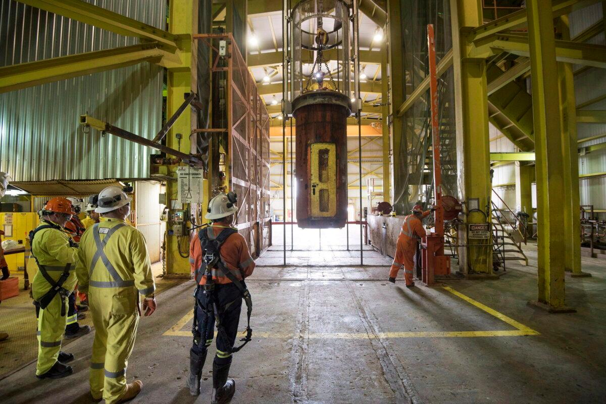 Employees wait to be taken underground at the Mosaic potash mine in Esterhazy, Sask., in a file photo. (The Canadian Press/Liam Richards)