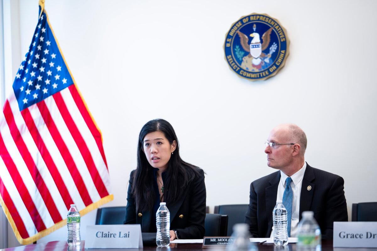 Claire Lai (L), daughter of Jimmy Lai, and Rep. John Moolenaar (R-Mich.), chairman of the House Select Committee on the CCP, at a press conference on Capitol Hill in Washington on March 19, 2026. (Madalina Kilroy/The Epoch Times)