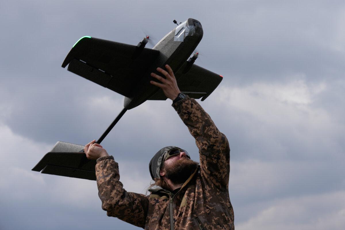 A student soldier of the Yatagan School for Unmanned Aerial Systems launches a training target drone in Kyiv, Ukraine, on March 19, 2026. (Efrem Lukatsky/AP)