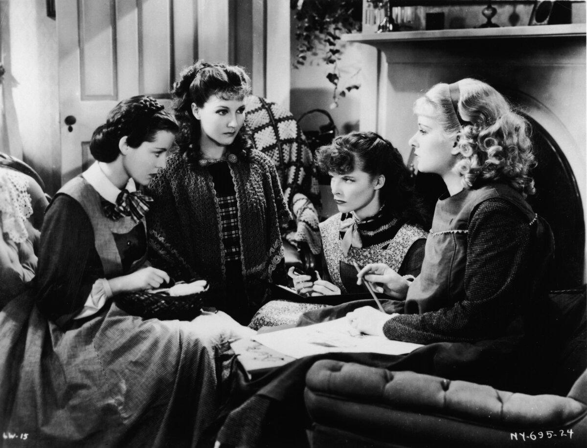 (L–R) Beth (Jean Parker), Amy (Joan Bennett), Jo (Katharine Hepburn), and Meg (Frances Dee), in “Little Women.” (RKO Radio Pictures/MovieStillsDB)