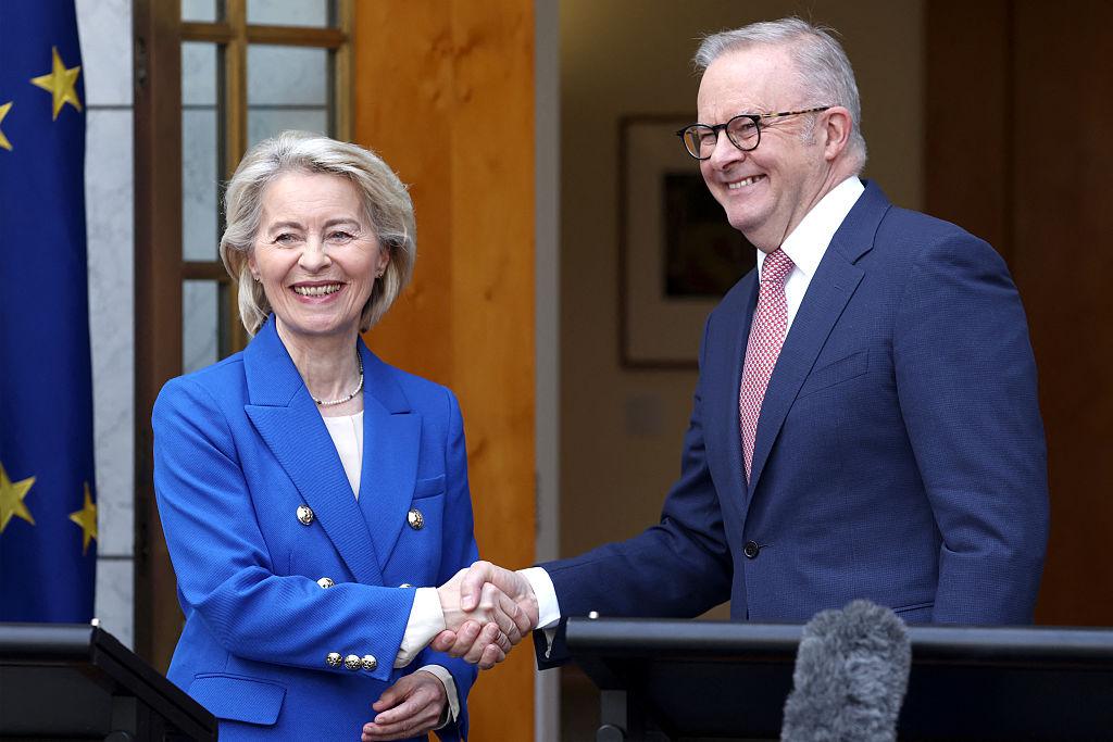 Australian Prime Minister Anthony Albanese (R) and European Commission President Ursula von der Leyen shake hands during a joint press conference at Parliament House in Canberra, Australia on March 24, 2026. (David Gray/AFP via Getty Images)