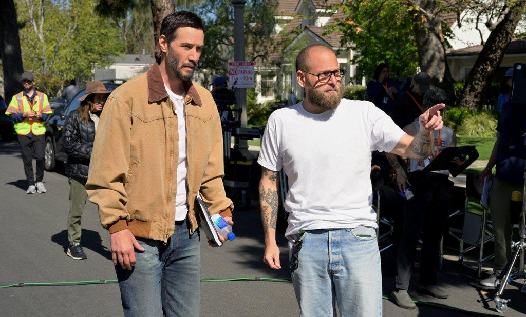 Keanu Reeves and Jonah Hill on the set of "Outcome." (Apple TV)