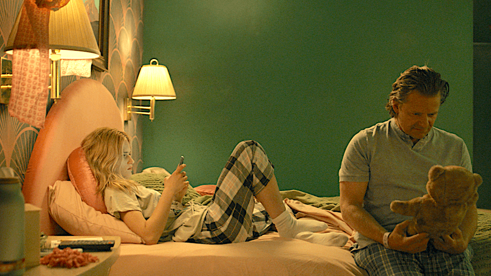 Claire (Audrey Zahn) and dad Jason (Steve Zahn) talk in a motel room, in "She Dances." (Macaroni Art Productions/EKKL Entertainment)