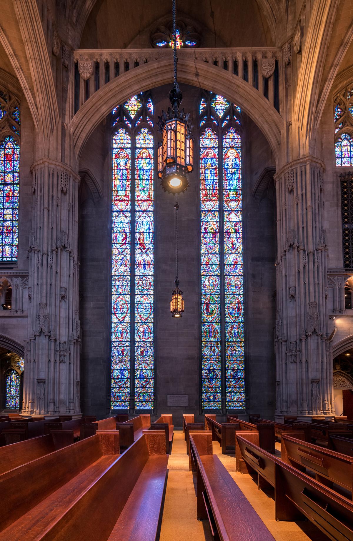 Measuring 73-feet-tall, Charles J. Connick's stained-glass lancet windows at the University of Pittsburgh’s Heinz Memorial Chapel are regarded as the artist’s longest stained-glass windows. (Steve Heap/Shutterstock)