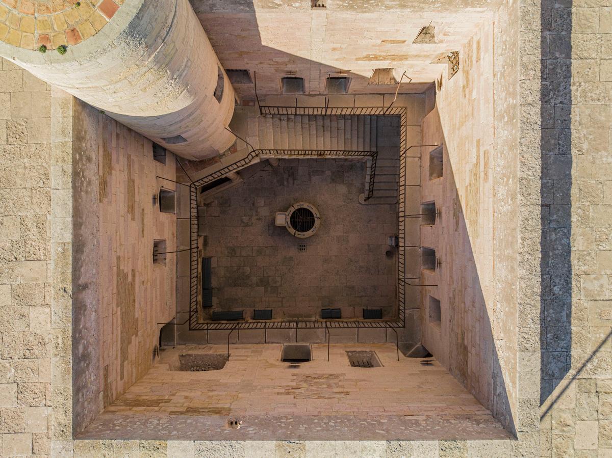 This top-down view reveals the courtyard at the heart of the Château d’If, with prison cells lining its edges. From the inner courtyard stairs, visitors can access the Saint Christophe Tower, or keep, which houses a spiral staircase leading to a high terrace and expansive views over Marseille, France. (Stéphane Aboudaram/Centre des monuments nationaux)