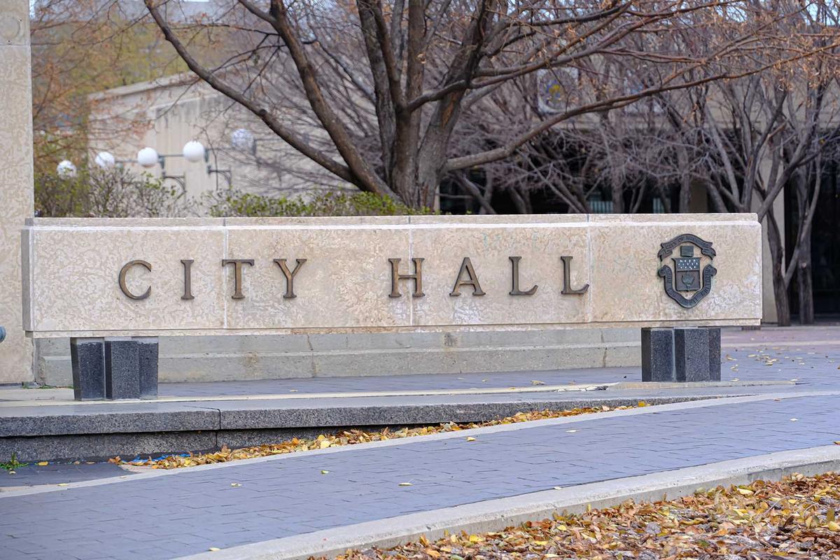 A city hall sign is seen outside Winnipeg City Hall. (Primestock Photography/Shutterstock)