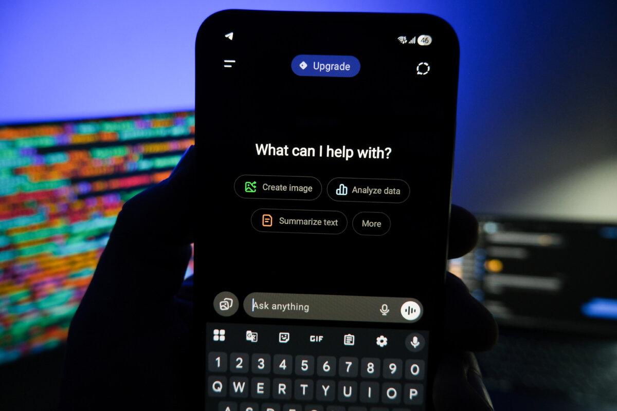 The screen shows the ChatGPT app in this photo illustration. (Oleksii Pydsosonnii/The Epoch Times)