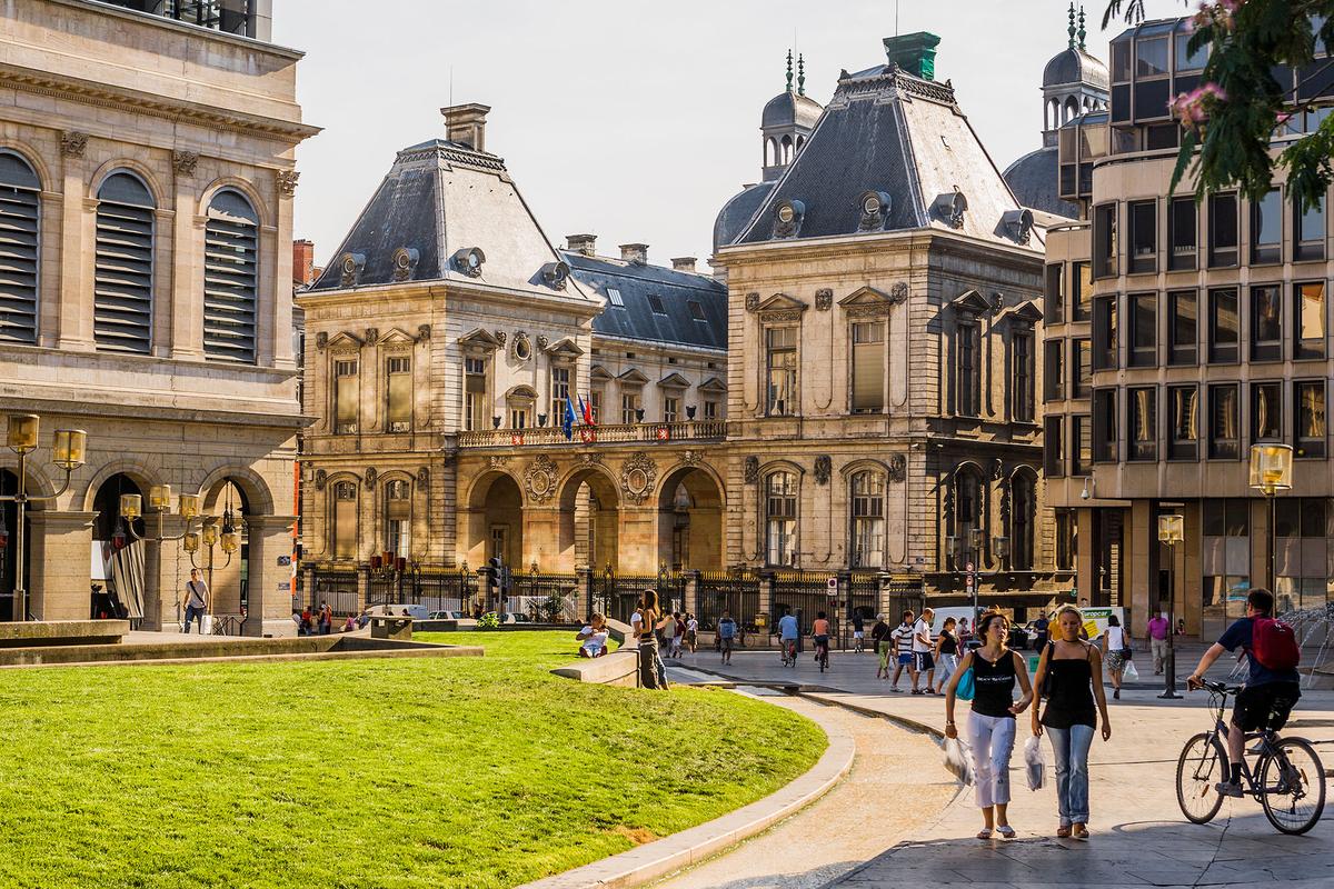 The Opéra Nouvel, Lyon's main opera house, and the 17th-century Hôtel de Ville. Both buildings are located on Place des Terreaux, a central square in Lyon. (Maremagnum/Getty Images)