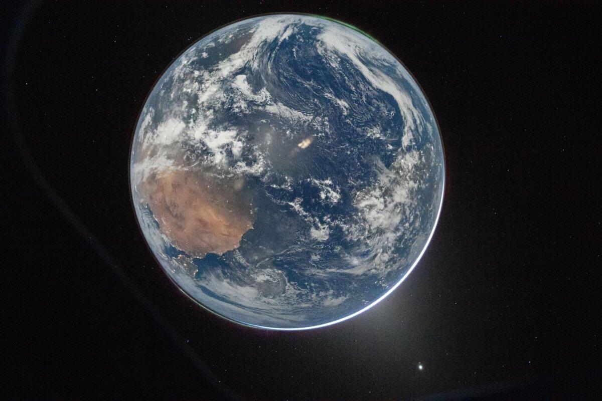A view of Earth taken by NASA astronaut and Artemis II Commander Reid Wiseman from the Orion spacecraft's window after completing the translunar injection burn on April 2, 2026. (NASA)