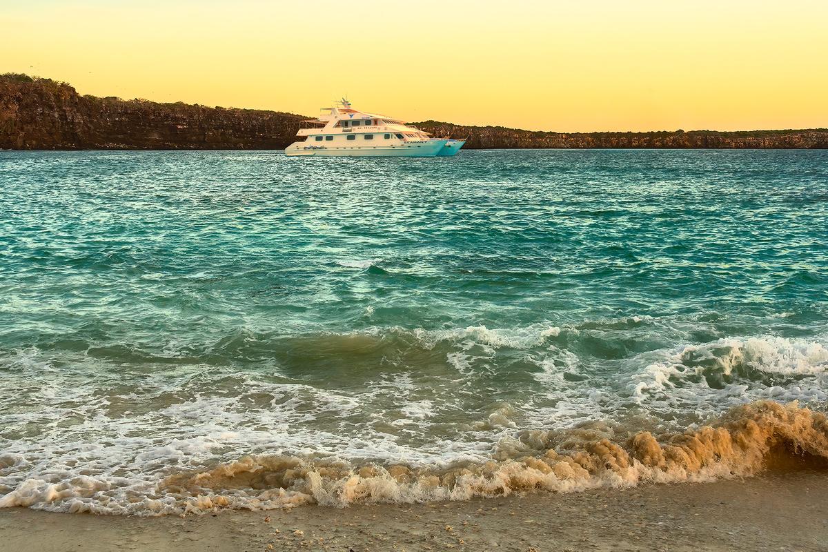 <span style="font-weight: 400;">The eight-cabin catamaran Seaman Journey anchored in Darwin Bay off Genovesa Island</span>. (Maria Coulson)
