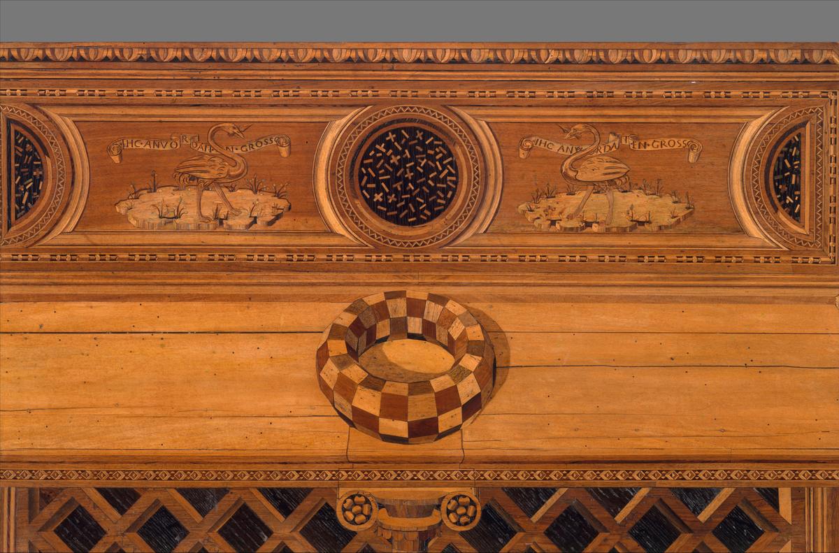 A detail of the "mazzocchio" (headgear) and backrest panels with ostriches from lower section of panel 7 in "Studiolo" from the Ducal Palace in Gubbio. Metropolitan Museum of Art, New York City. (Public Domain)