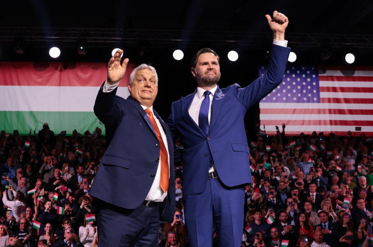 U.S. Vice President JD Vance and then-Hungarian Prime Minister Viktor Orban (L) wave to the audience during a Day of Friendship event in Budapest, Hungary, on April 7, 2026. (Jonathan Ernst/Pool Photo via AP)