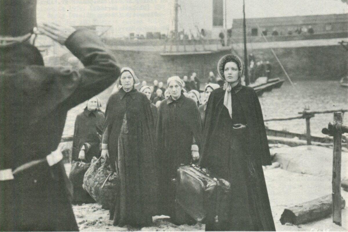 Florence Nightingale (Kay Francis, R) and her nurses arrive to treat soldiers during the Crimean War, in "The White Angel." (Warner Bros. Pictures)