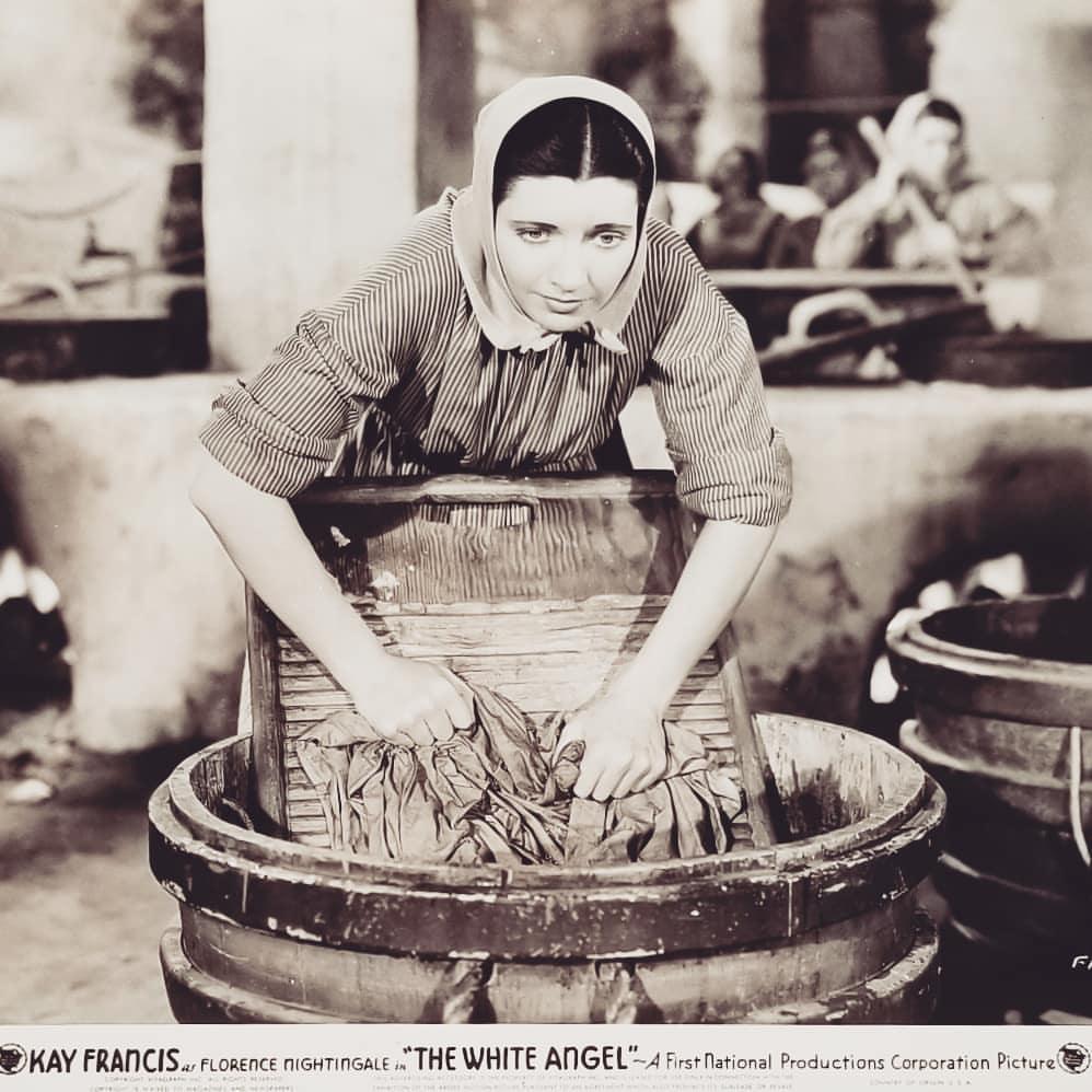 Florence Nightingale (Kay Francis) washes clothes, in "The White Angel." (Warner Bros. Pictures)