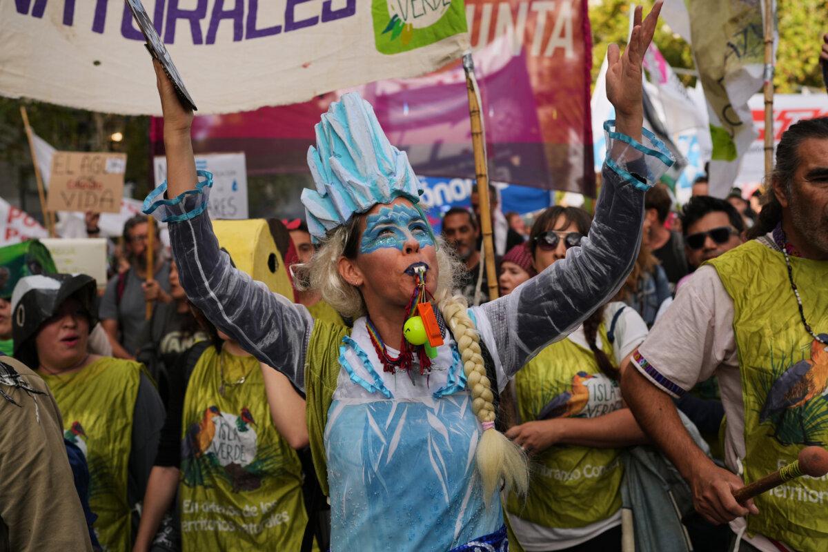 Demonstrators protest outside Congress as lawmakers debate the government's proposal to reform  glacier protection laws in Buenos Aires on April 8, 2026. (Rodrigo Abd/AP Photo)