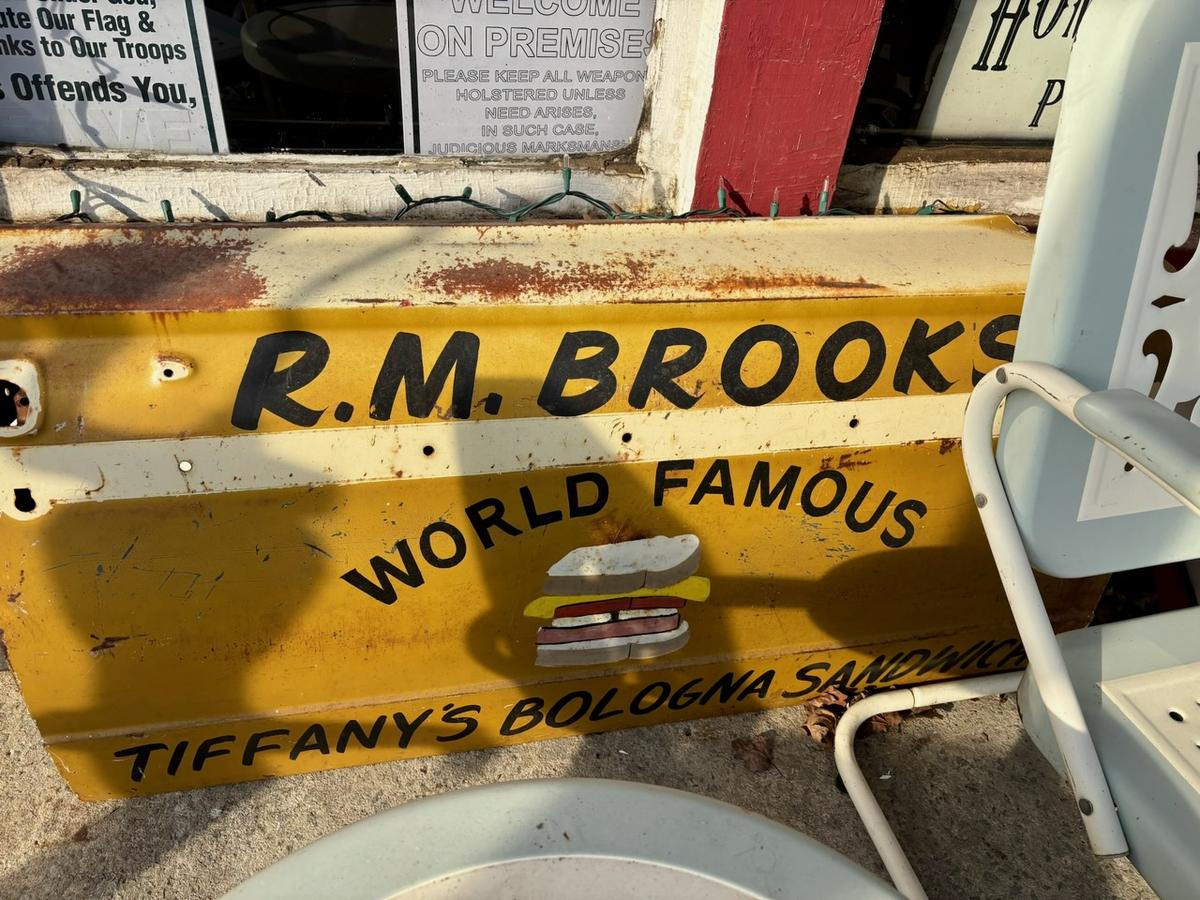 Antique signs for the general store are still around. (Deena Bouknight)