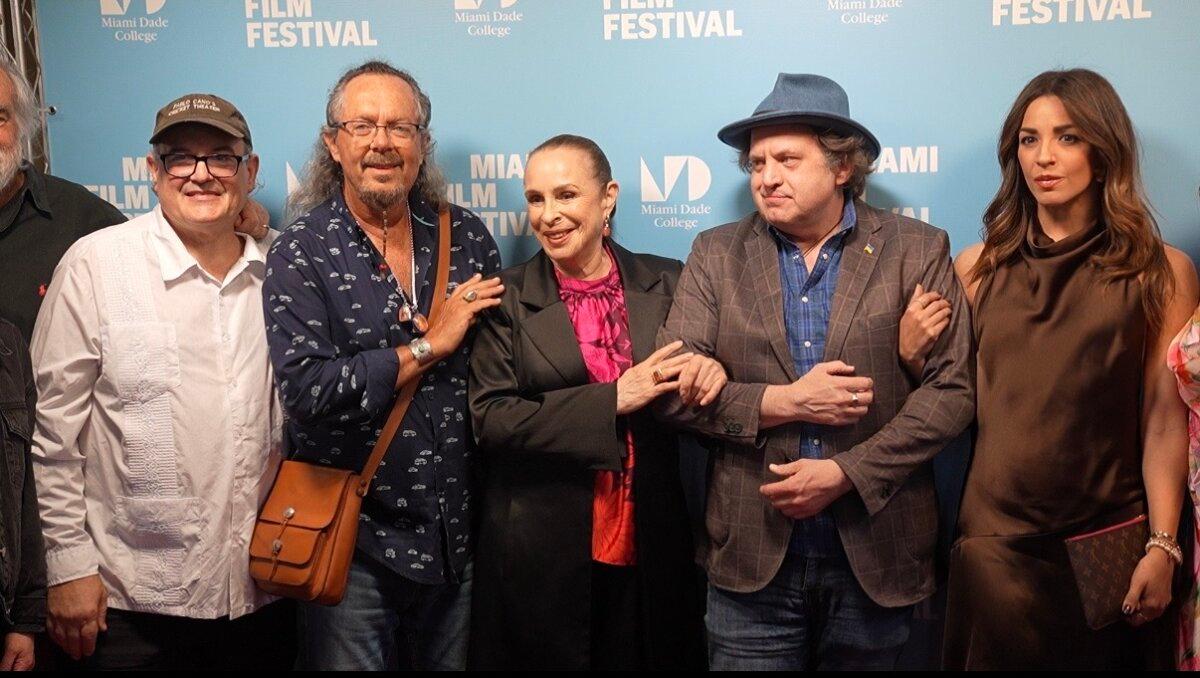 Alina Fernández (C), Fidel Castro's daughter, poses with other crew members of documentary "Revolution's Daughter." The film was released in Miami, Fla., on April 10, 2026. (Troy Myers/The Epoch Times)