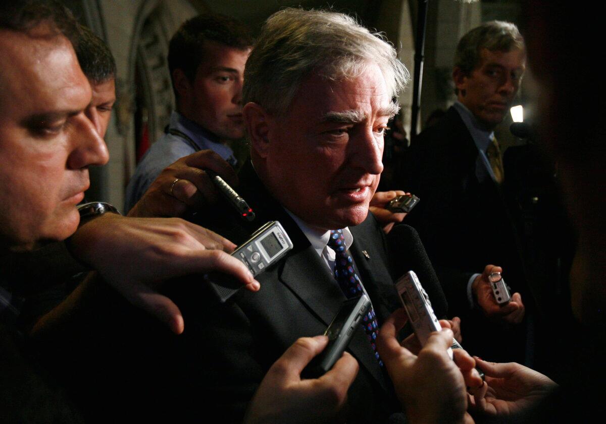 Then-Trade Minister David Emerson speaks to media in the foyer of the House of Commons on Parliament Hill in Ottawa on June 16, 2008. (The Canadian Press/Sean Kilpatrick)