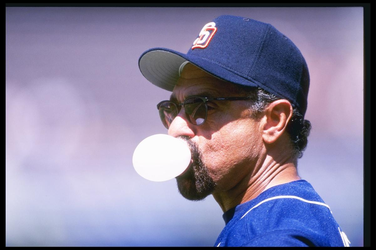 Davey Lopes of the San Diego Padres blows bubbles during a game against the Chicago Cubs at Qualcomm Stadium in San Diego on May 8, 1997. (Jamie Squire/Allsport)